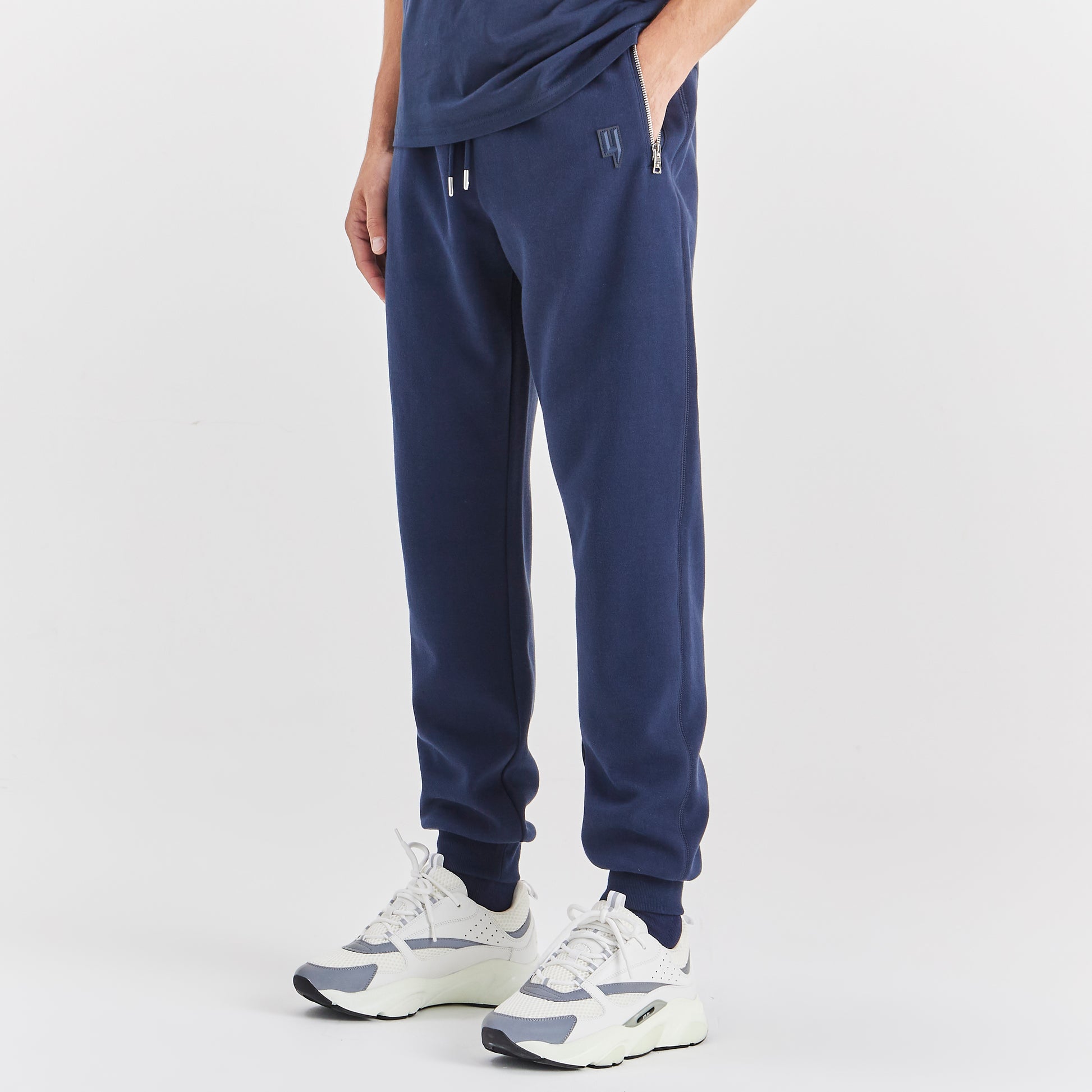 TECH TRACKSUIT BOTTOMS NAVY – YELIR WORLD